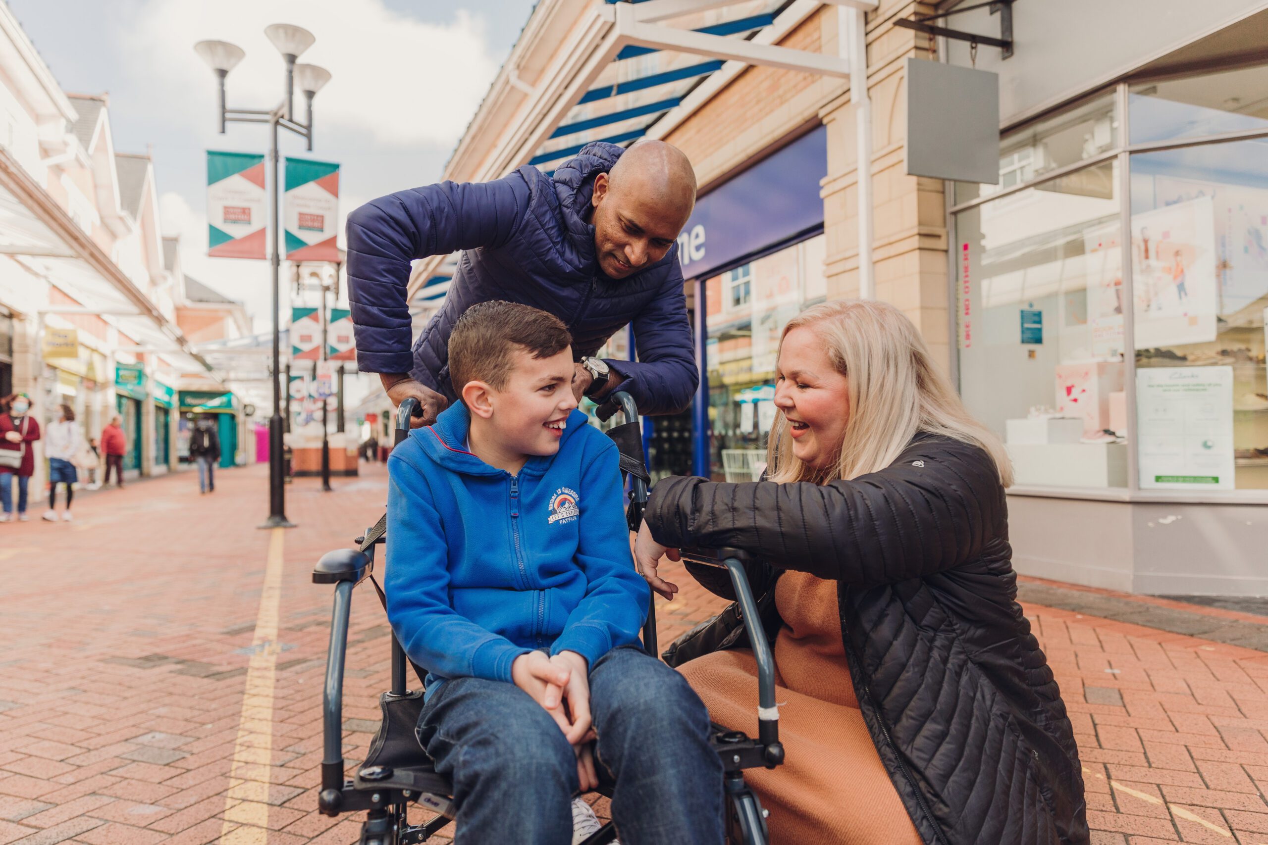 dissabled child with family